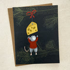 Greeting card with illustration of a mouse reaching for a cheese ornament against a dark background with Christmas tree branches.