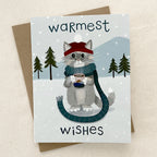 Winter cat greeting card on a cream background
