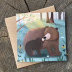 Greeting card with illustration of a bear and cub in a forest