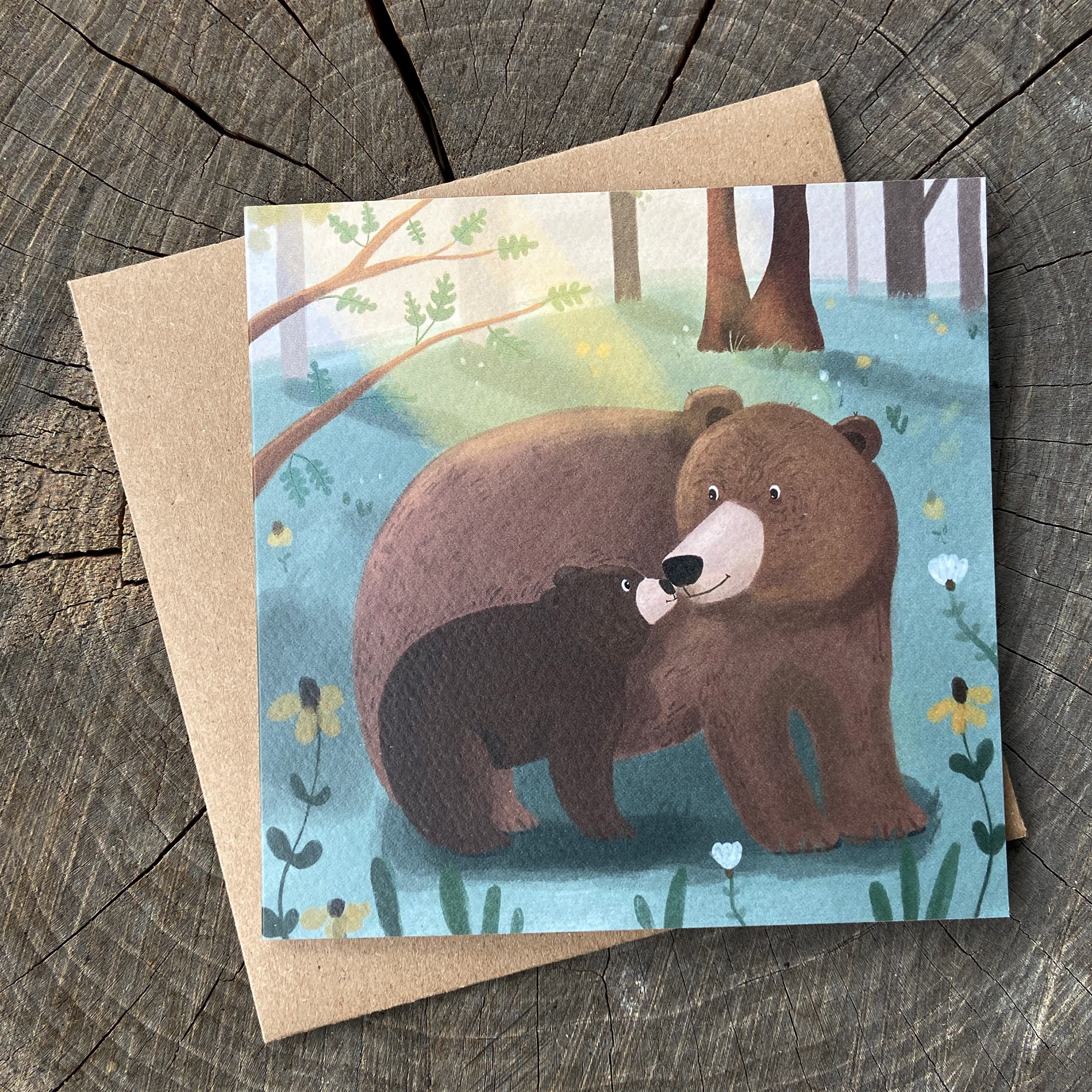 Greeting card with illustration of a bear and cub in a forest
