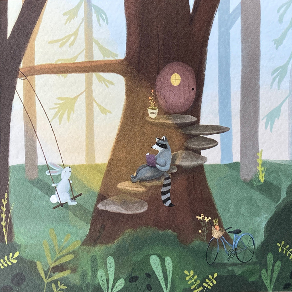 Close up greeting card illustration of a raccoon and rabbit in a forest with a treehouse and bicycle.