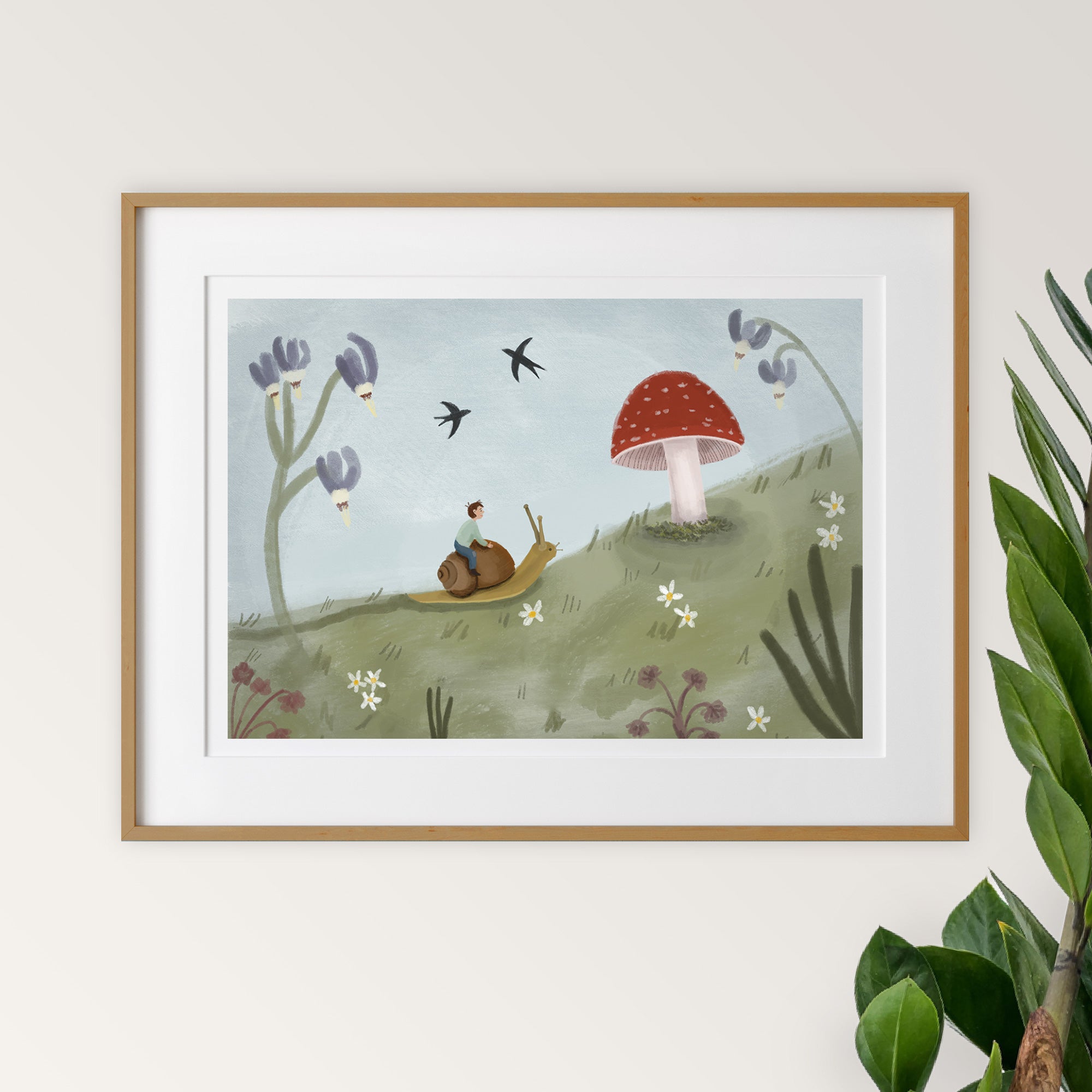Framed illustration of a child on a snail with a mushroom in a garden setting.