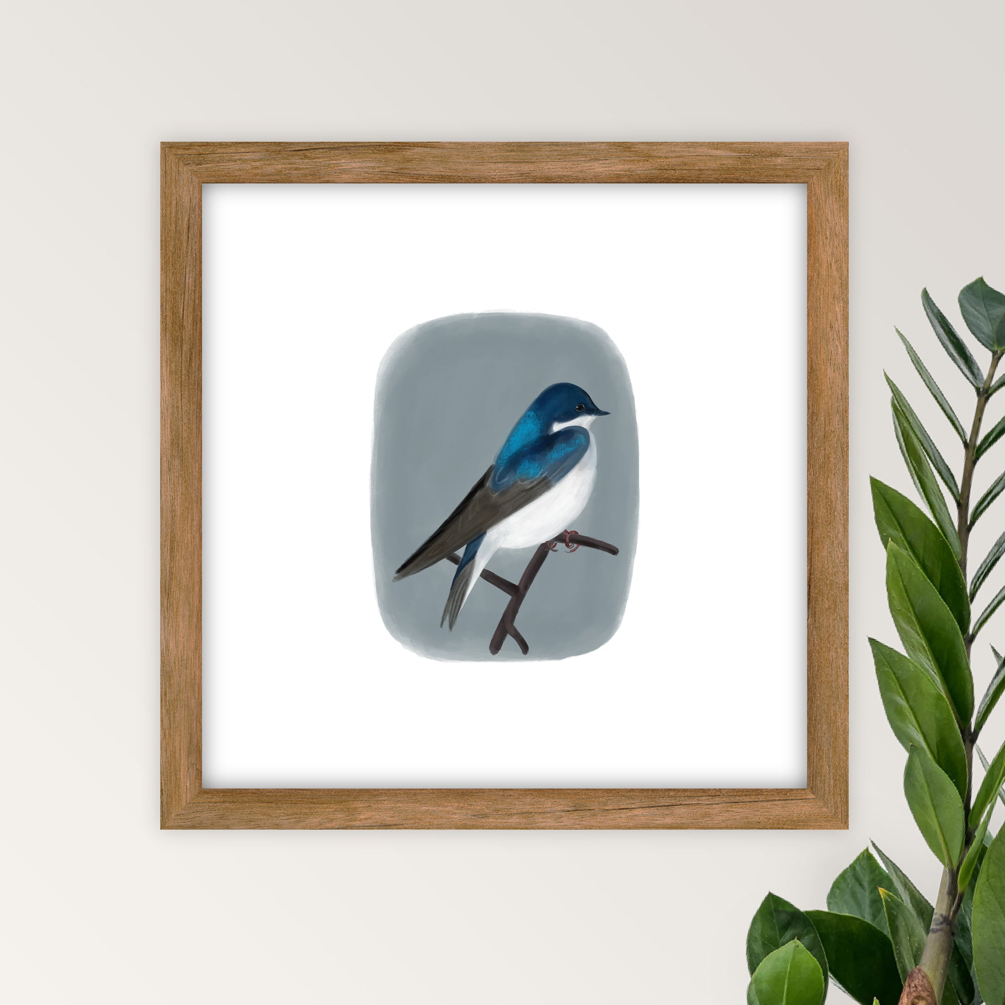Framed artwork of a bird on a blue gray background.