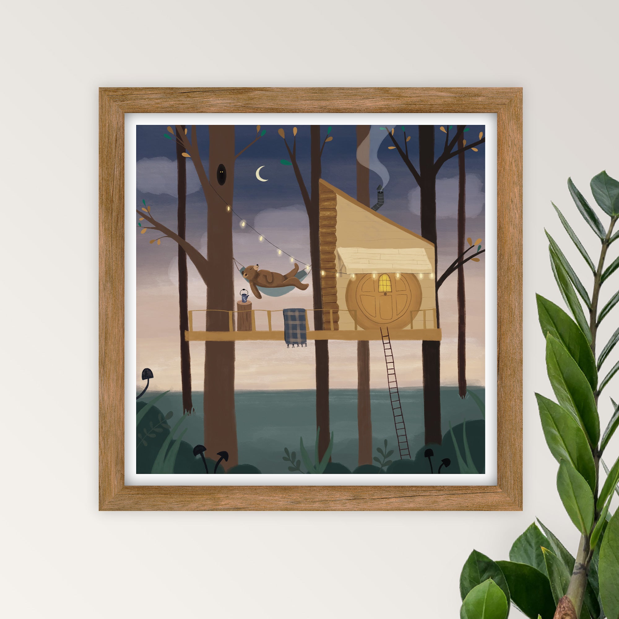 Magical art print of a bear relaxing in a treehouse in a forest while the sun sets