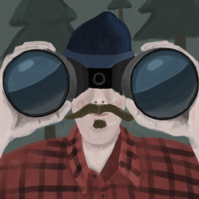 Man looking through binoculars in forest